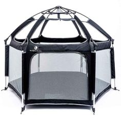 a black and white dog playpen with mesh inside it's door open, on a white background