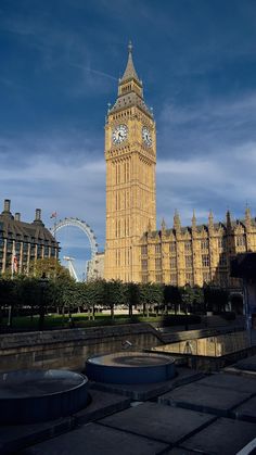 the big ben clock tower towering over the city of london