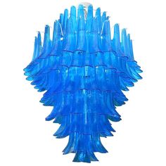 a blue chandelier hanging from the ceiling