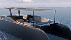 a boat is floating on the water with its canopy extended to allow people to relax