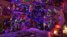 a bedroom decorated with christmas lights and decorations