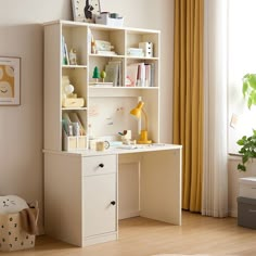 a room with a desk, chair and bookshelf