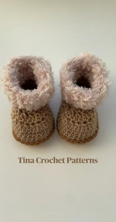 there is a pair of crocheted baby shoes