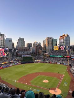 a baseball stadium filled with lots of people