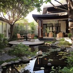 a small pond in the middle of a garden with chairs and tables around it, surrounded by trees