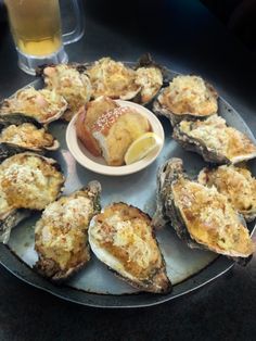 oysters on the half shell with dipping sauce