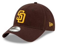 PRICES MAY VARY. Completing your game day outfit with a new cap is vital to a true San Diego Padres fan like you. Add another option to choose from this season with this San Diego Padres Logo 9Forty and 9TWENTY adjustable hats from New Era. The graphics on the crown provide a bold look that will make for the perfect accent to your go-to tee, while the relaxed design ensures a comfortable feel any time you wear it. Material: 100% Polyester Velcro or slide Buckle closure Adjustable strap-back encl San Diego Padres Logo, Padres Logo, Game Day Outfit, San Diego Padres, Gameday Outfit, Day Outfit, Dad Hat, Hat Cap, Adjustable Hat