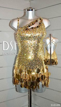 a mannequin with gold sequins on it