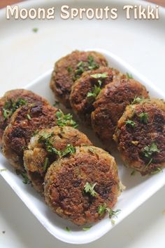 some food is sitting on a white plate with the words moong sprouts tiki