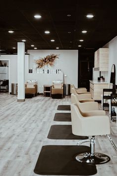 the salon is clean and ready for customers to take their own seats on the chairs