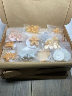 a box filled with lots of different types of cookies