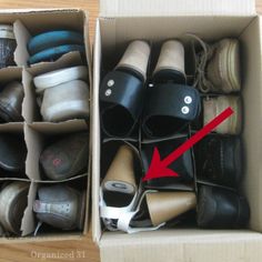 an open cardboard box filled with lots of shoes