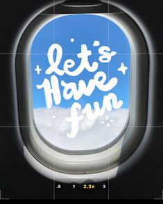 an airplane window with the words let's have fun written on it in white