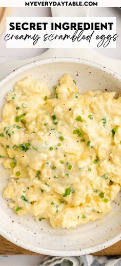 a bowl filled with mashed potatoes on top of a table