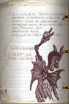 an open book with writing on it and a drawing of a demon in the middle