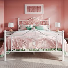 a bedroom with pink walls, white bed and two lamps on either side of the bed