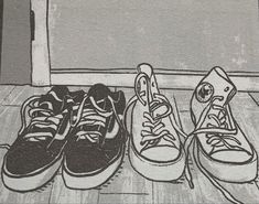 three pairs of shoes are lined up on the floor