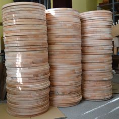 stacks of wooden discs sitting next to each other