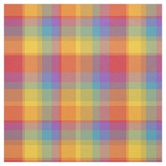 an orange, yellow and blue plaid pattern is shown in the middle of this image