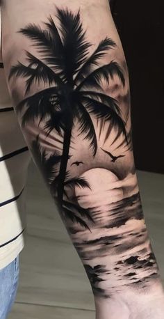 a man with a palm tree tattoo on his arm