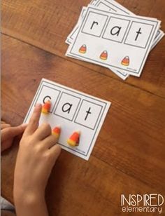 a child is making matching cards with candy corn