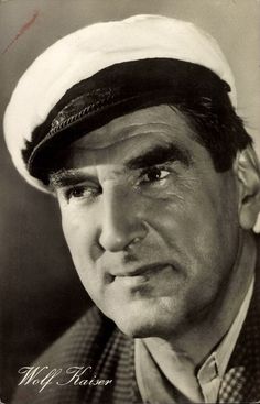 an old black and white photo of a man wearing a sailor's hat