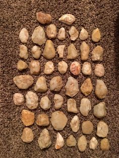 several rocks arranged in a circle on the floor