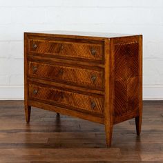 an old wooden dresser with three drawers