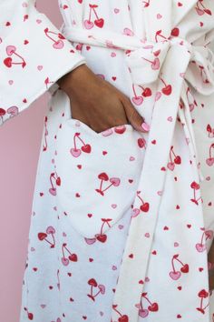 Designer Notes Introducing our stunning Chérie Robe crafted from 100% organic cotton for ultimate comfort and style. With its eye-catching cherry print and heart-shaped pockets, this robe is the perfect addition to your loungewear collection Made with high-quality, 100% organic cotton, ensuring a soft and breathable feel against your skin. The robe is designed with a roomy, relaxed fit and a waist tie for an adjustable and comfortable fit. The cherry heart print adds a fun and playful touch to t Cute Robes, Heart Pajamas, Pijamas Women, Terry Robe, Heart Prints, Cute Pjs, Cute Pajama Sets, Cute Pajamas, January 2024