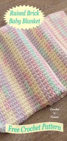 a crocheted baby blanket with the text raised brick baby blanket free crochet pattern