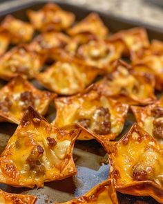 some food that is sitting on a pan and ready to be cooked in the oven