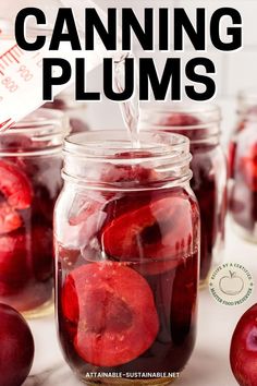 canning plums in mason jars with text overlay