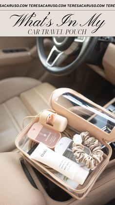 an open purse sitting on top of a car seat