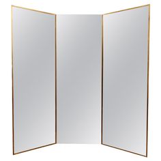 an open folding mirror on a white background