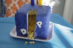 a birthday cake with the letter p in it