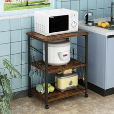 a microwave oven sitting on top of a wooden shelf