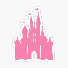 a pink castle sticker sitting on top of a white wall