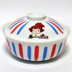 a red, white and blue striped bowl with a cartoon character on the lid is shown