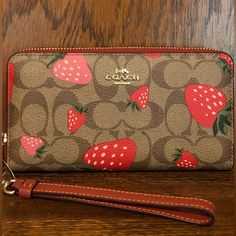 *Nwt-Coach-Long Zip Around Wallet-Signature Canvas & Wild Strawberryprint-$318: *Product Details: Signature Coated Canvas & Smooth Leather Wild Strawberry Print Zip-Around Closure Detachable Wristlet Strap 12 Credit Card Slots Full-Length Bill Compartments Interior Zip Coin Pocket 7-1/2" L X 4" H X 1" W Style: Ch523 Msrp $318 + Tax *Kept In Original Coach Packaging. *Shipped Promptly-Usually The Same Day As Purchased. If Not Possible, Then Item Will Be Shipped Out The Next Available Business Day Purple Color Block, Wild Strawberry, Wild Strawberries, Large Wallet, Strawberry Print, Signature Canvas, Slim Wallet, Mini Wallet, Zip Wallet