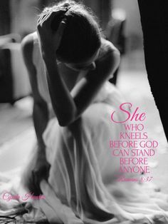 a woman sitting on the ground with her head in her hands and she who kneels before god can stand before anyone