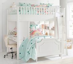 a white bunk bed sitting in a bedroom next to a desk and chair on top of a hard wood floor