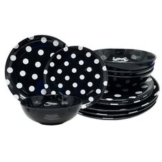 black and white polka dot plates stacked on top of each other