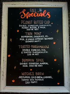 the menu for fall special features pumpkins and sprinkles on black paper