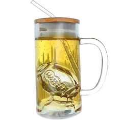 a beer mug with a straw sticking out of it