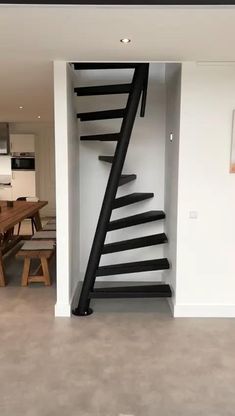 a spiral staircase in the middle of a room