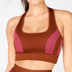 Color: Java/Tapioca/Plush Pink Seamless Construction For A Seamless Workout, Racerback Bra With Retro Stripe Details Is Chafe-Resistant While Still Providing Support. Features Moisture-Wicking Seamless Stretch T-back Sports Bra, Brown Seamless Stretch Activewear, Brown Seamless Activewear, Athleisure Seamless T-back Sports Bra, Fitted Seamless Brown Sports Bra, Fitted Brown Seamless Sports Bra, Seamless Compressive T-back Activewear, High Stretch Seamless T-back Sports Bra, Seamless High Stretch T-back Sports Bra