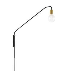 a black and gold floor lamp on a white background with a light bulb in the middle