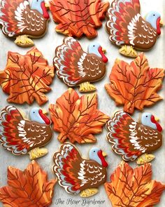 decorated cookies with leaves and turkeys on them