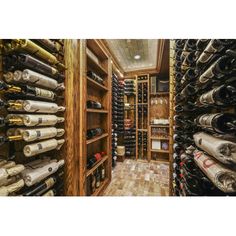 a wine cellar filled with lots of bottles