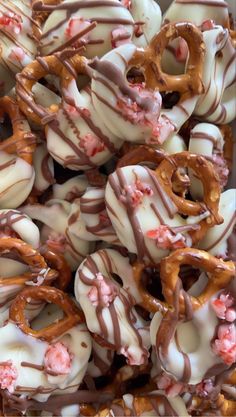 a box full of pretzels covered in chocolate and marshmallows